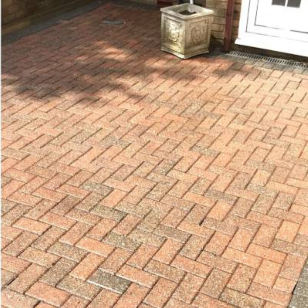 Clean driveway after pressure washing